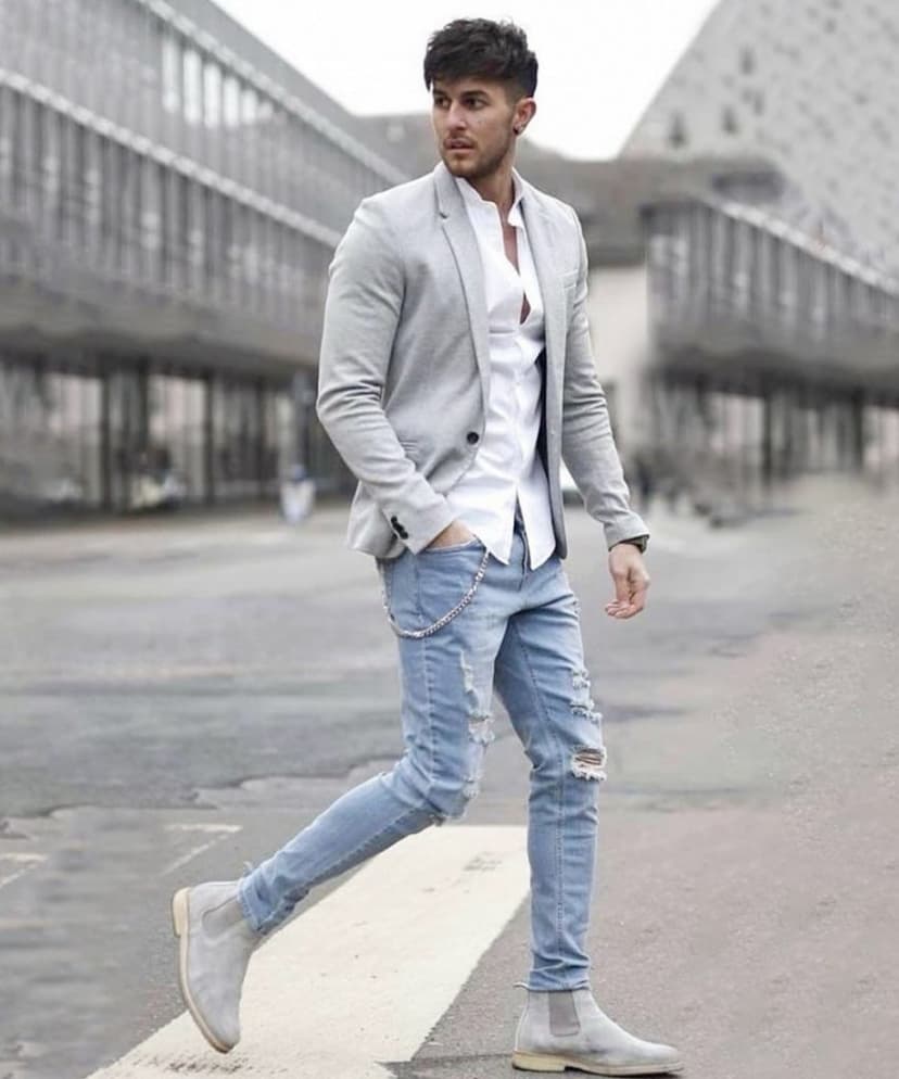 https://backend.antailors.ae/wp-content/uploads/2025/05/grey-blazer-combination-with-jeans-853x1024-1.jpg